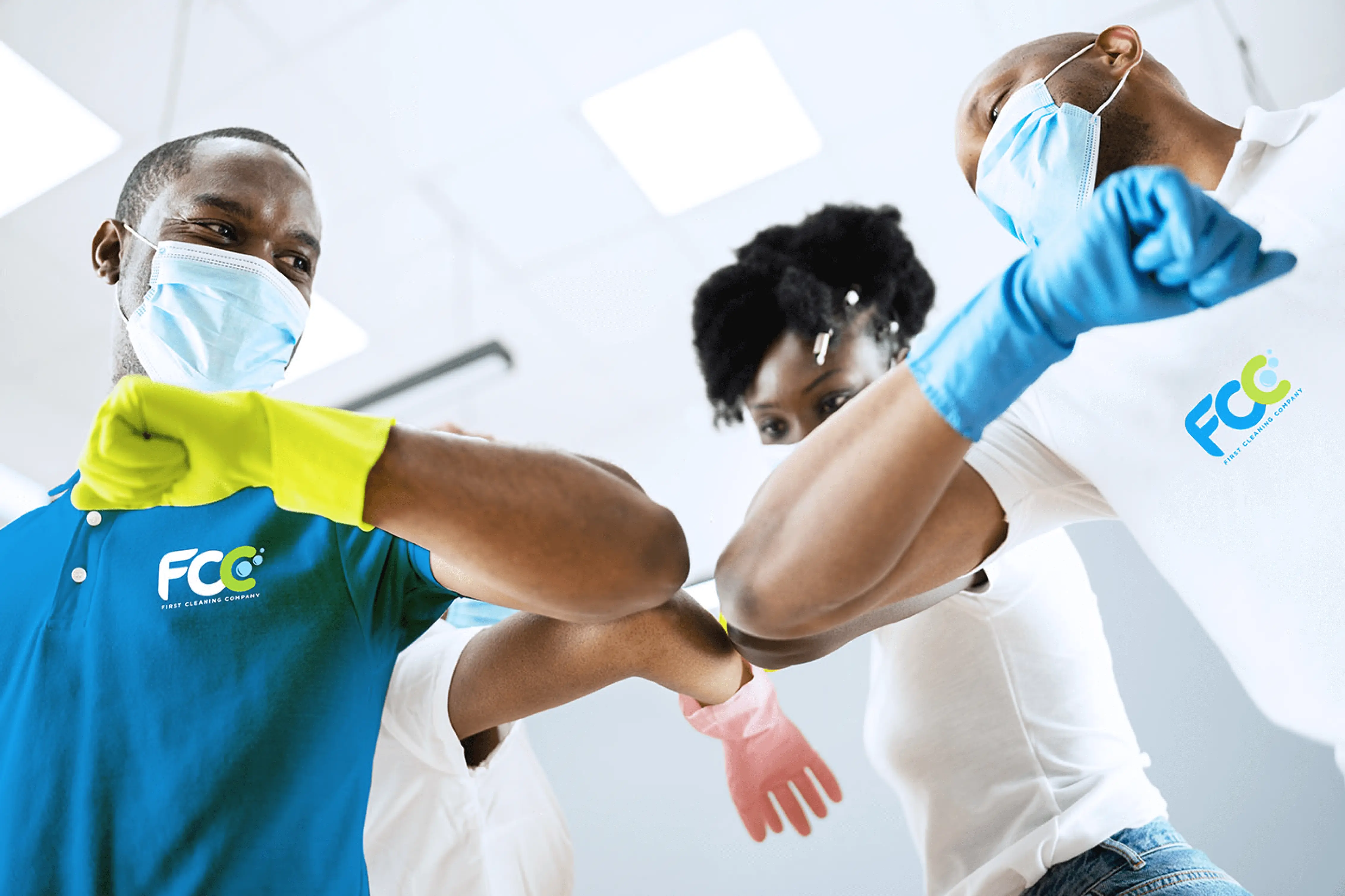 Cleaning professionals wearing masks and gloves